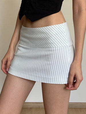 , Y2K skirt styled with a crop top