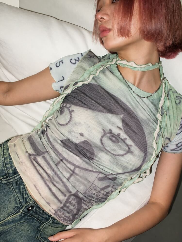 Weirdcore Graphic Baby Tee with sheer mesh, Y2K baby tee styled with low rise bottoms