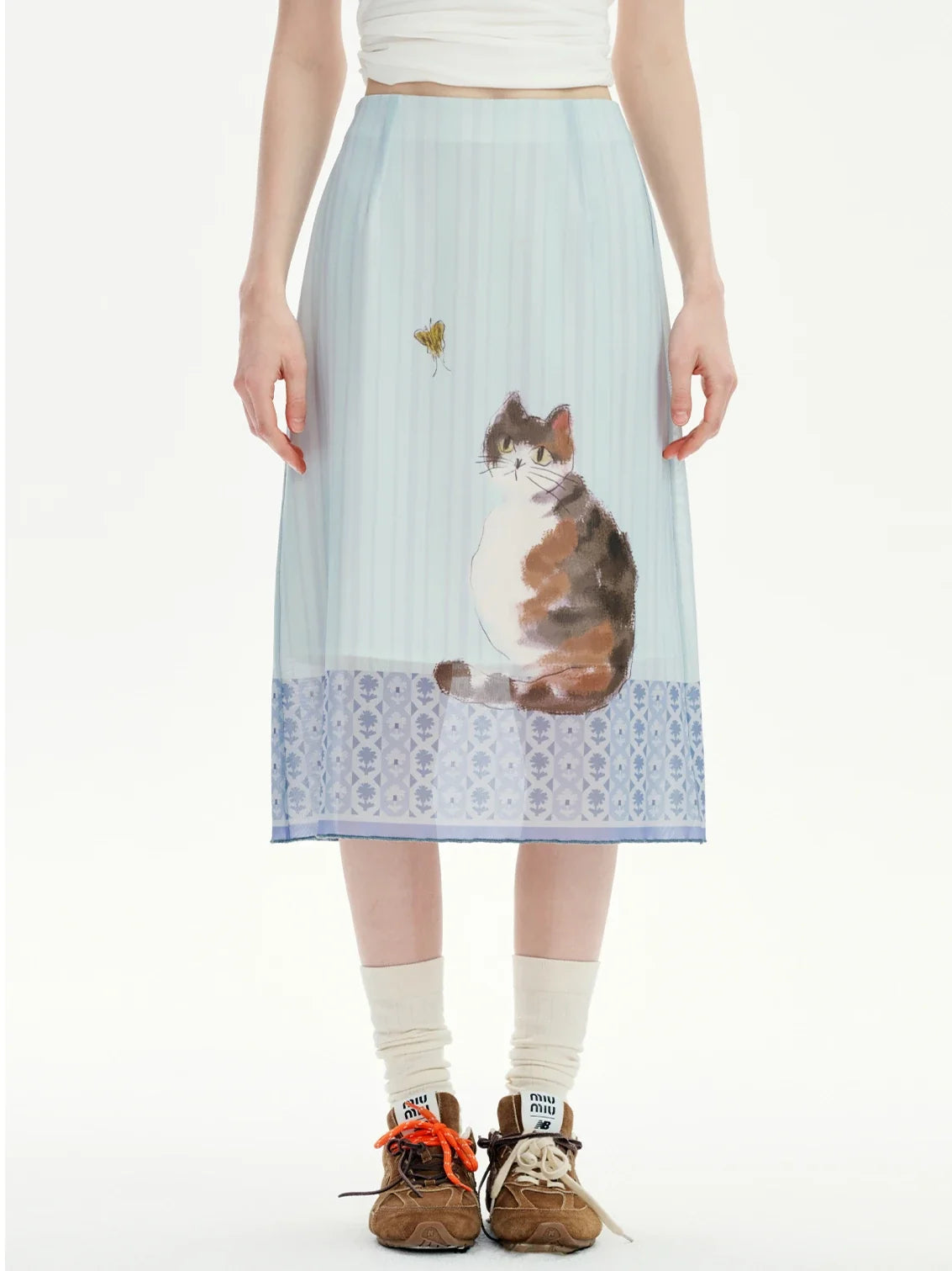 , Y2K skirt styled with a crop top