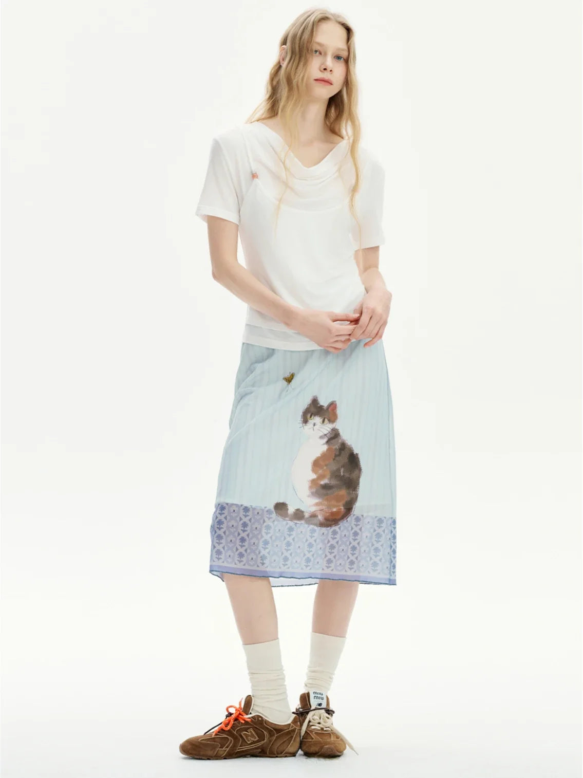 , Y2K skirt styled with a crop top