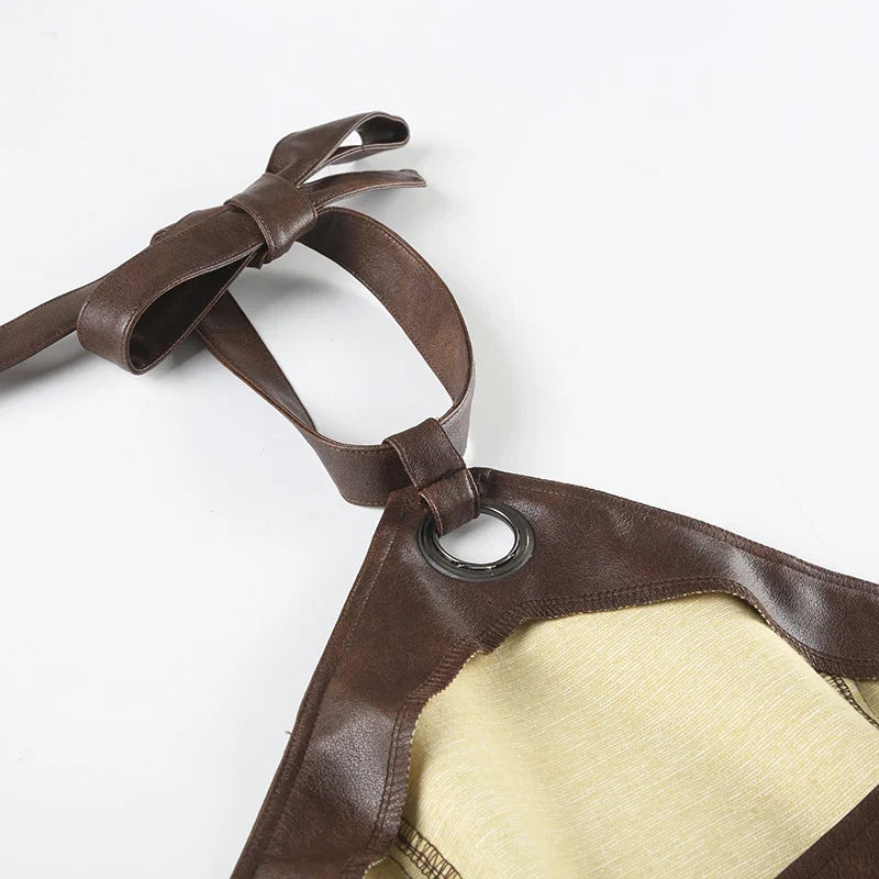 Y2K Faux Leather Halter Top with lace trim, Y2K halter top styled with low rise bottoms