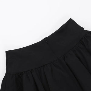 , Y2K skirt styled with a crop top