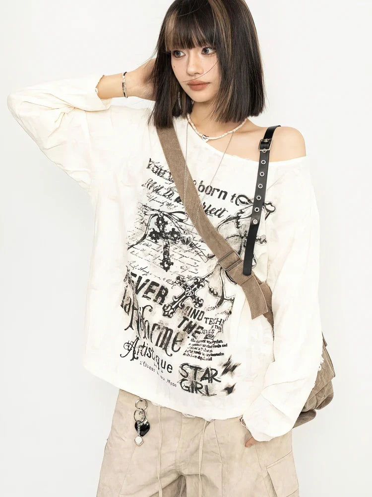 Y2K Grunge Distressed Top with printed graphic, Y2K long sleeve top styled with low rise bottoms