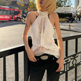 Y2K Lace Draped Halter Top with lace trim, Y2K halter top styled with low rise bottoms