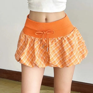 , Y2K skirt styled with a crop top