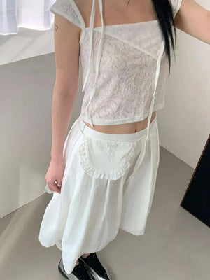 , Y2K skirt styled with a crop top