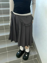 , Y2K skirt styled with a crop top