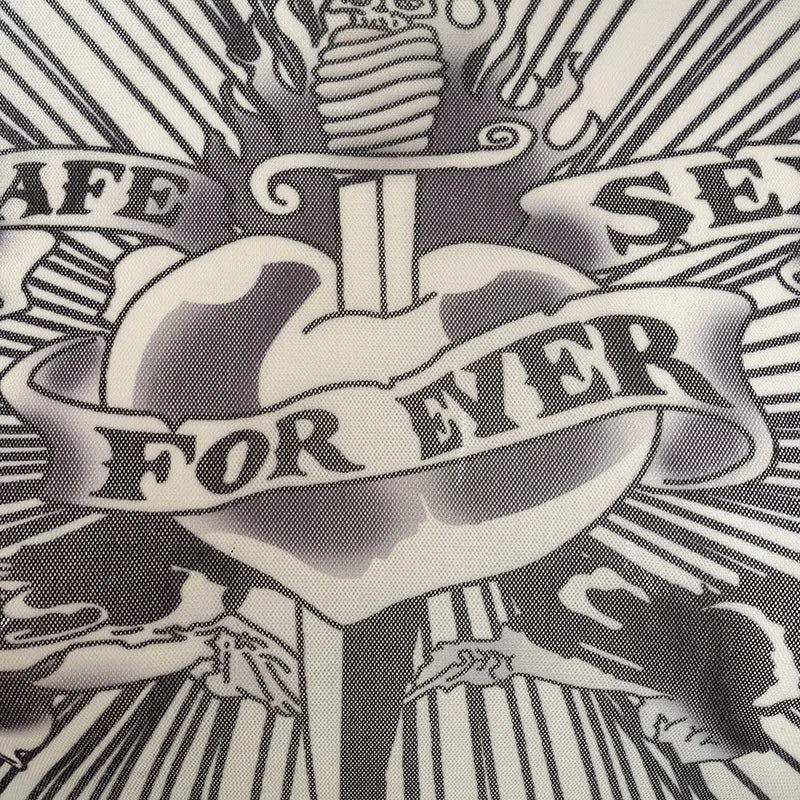 Y2K Sacred Heart Top with printed graphic, Y2K long sleeve top styled with low rise bottoms