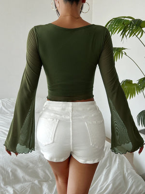Y2K Tie Front Sheer Sleeve Top with sheer mesh, Y2K long sleeve top styled with low rise bottoms