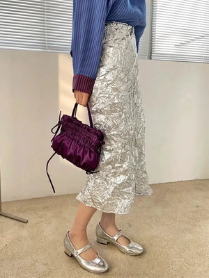 , Y2K skirt styled with a crop top