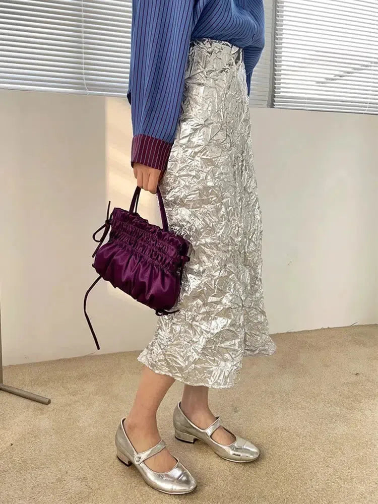 , Y2K skirt styled with a crop top